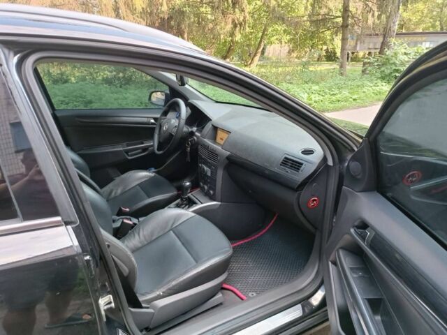 Черный Опель Астра, объемом двигателя 1.9 л и пробегом 250 тыс. км за 4500 $, фото 5 на Automoto.ua