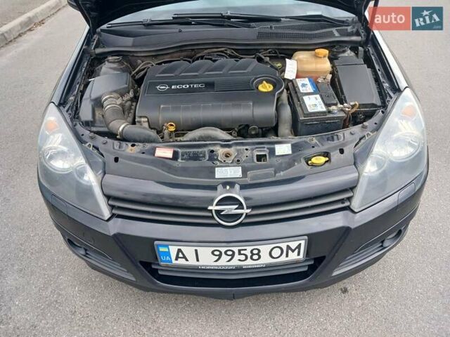 Черный Опель Астра, объемом двигателя 1.9 л и пробегом 312 тыс. км за 4200 $, фото 8 на Automoto.ua