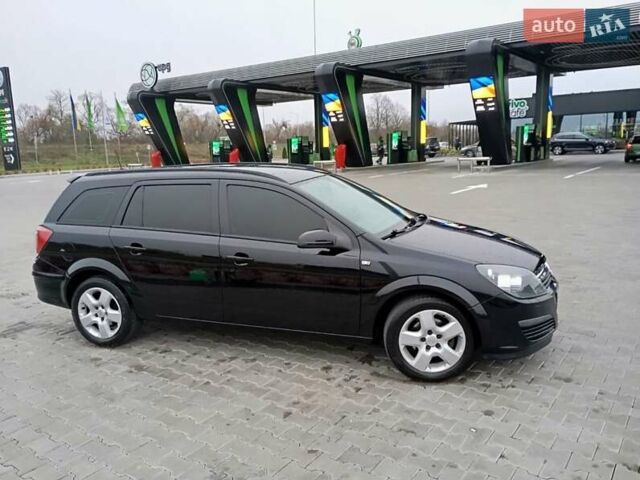 Черный Опель Астра, объемом двигателя 1.6 л и пробегом 293 тыс. км за 4200 $, фото 7 на Automoto.ua