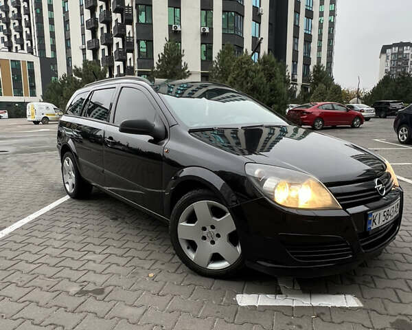 Черный Опель Астра, объемом двигателя 1.7 л и пробегом 330 тыс. км за 5200 $, фото 2 на Automoto.ua