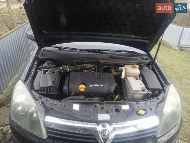 Черный Опель Астра, объемом двигателя 1.8 л и пробегом 198 тыс. км за 4800 $, фото 15 на Automoto.ua