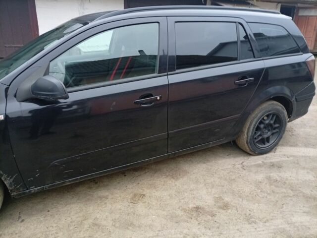 Черный Опель Астра, объемом двигателя 1 л и пробегом 276 тыс. км за 1900 $, фото 2 на Automoto.ua