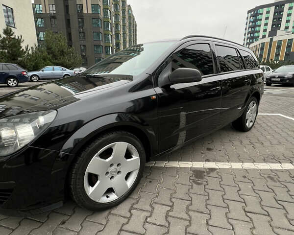 Черный Опель Астра, объемом двигателя 1.7 л и пробегом 330 тыс. км за 5200 $, фото 6 на Automoto.ua