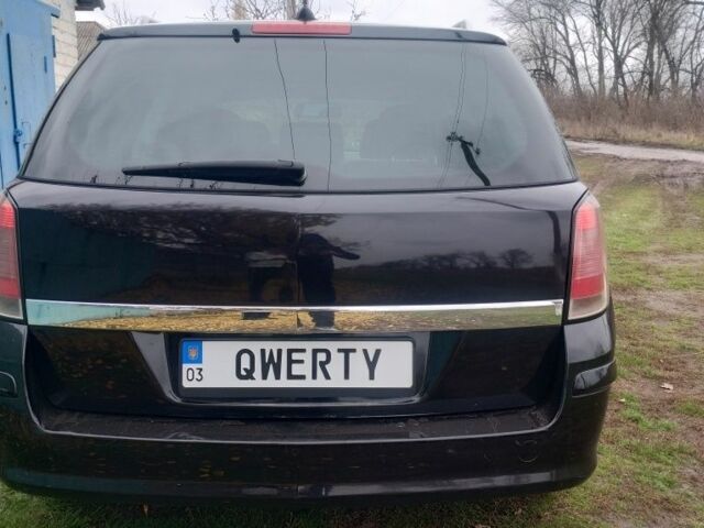 Черный Опель Астра, объемом двигателя 1.9 л и пробегом 320 тыс. км за 4999 $, фото 3 на Automoto.ua