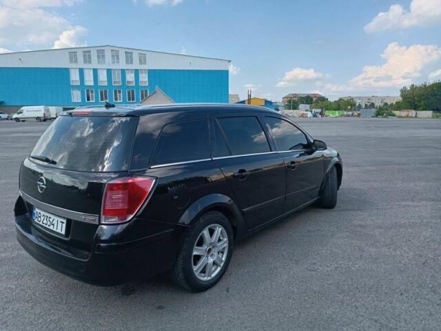 Черный Опель Астра, объемом двигателя 1.9 л и пробегом 250 тыс. км за 4500 $, фото 2 на Automoto.ua