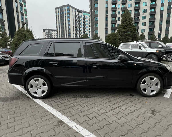 Черный Опель Астра, объемом двигателя 1.7 л и пробегом 330 тыс. км за 5200 $, фото 13 на Automoto.ua