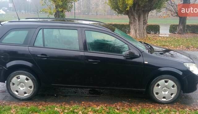 Черный Опель Астра, объемом двигателя 1.69 л и пробегом 387 тыс. км за 3500 $, фото 4 на Automoto.ua