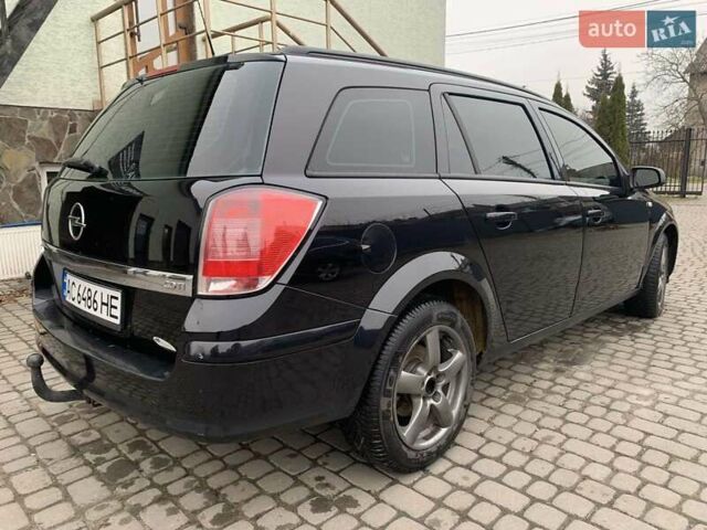 Чорний Опель Астра, об'ємом двигуна 1.25 л та пробігом 317 тис. км за 3500 $, фото 9 на Automoto.ua