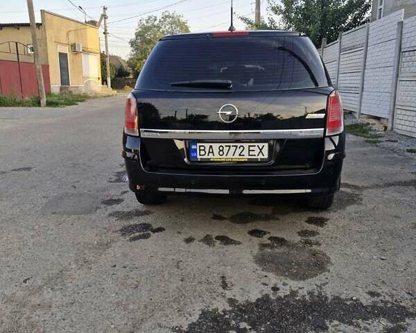 Черный Опель Астра, объемом двигателя 1.6 л и пробегом 270 тыс. км за 5300 $, фото 7 на Automoto.ua
