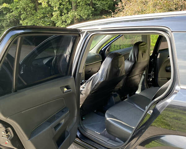 Черный Опель Астра, объемом двигателя 1.91 л и пробегом 295 тыс. км за 5200 $, фото 11 на Automoto.ua