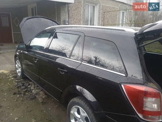 Черный Опель Астра, объемом двигателя 1.8 л и пробегом 198 тыс. км за 4800 $, фото 10 на Automoto.ua