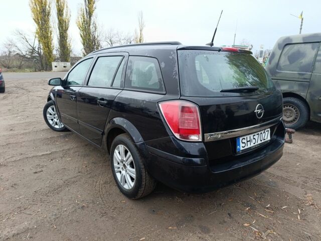 Черный Опель Астра, объемом двигателя 1.7 л и пробегом 333 тыс. км за 1900 $, фото 4 на Automoto.ua