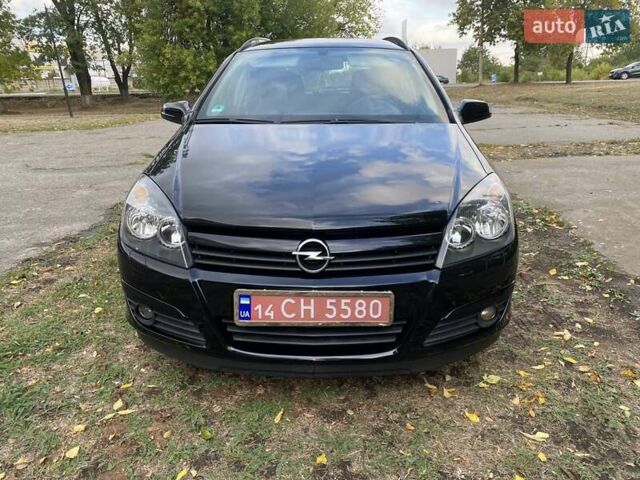 Черный Опель Астра, объемом двигателя 1.6 л и пробегом 197 тыс. км за 5500 $, фото 19 на Automoto.ua