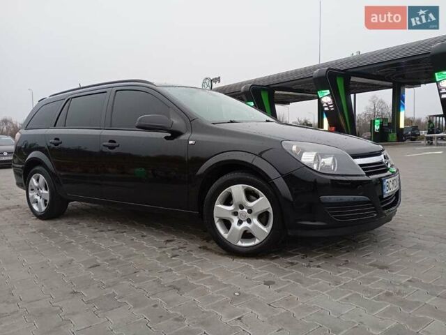 Черный Опель Астра, объемом двигателя 1.6 л и пробегом 293 тыс. км за 4200 $, фото 6 на Automoto.ua