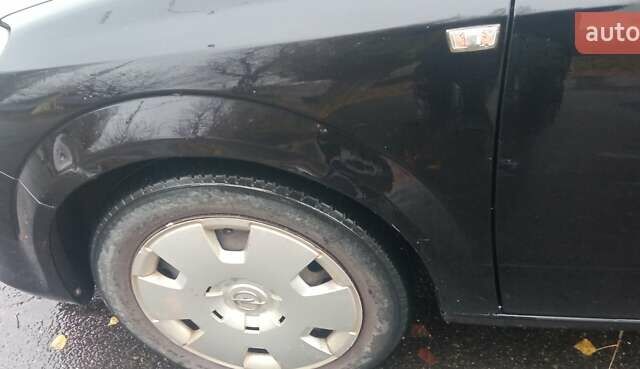 Черный Опель Астра, объемом двигателя 1.69 л и пробегом 387 тыс. км за 3500 $, фото 11 на Automoto.ua