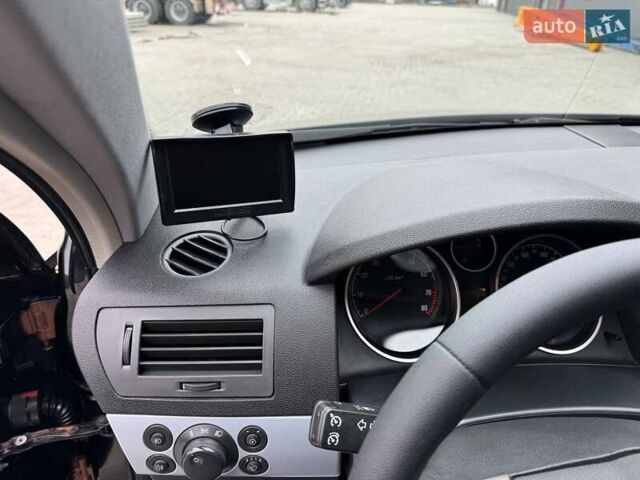 Черный Опель Астра, объемом двигателя 1.6 л и пробегом 229 тыс. км за 4900 $, фото 9 на Automoto.ua