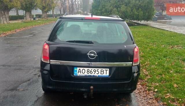 Черный Опель Астра, объемом двигателя 1.69 л и пробегом 387 тыс. км за 3500 $, фото 7 на Automoto.ua