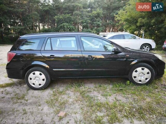 Черный Опель Астра, объемом двигателя 1.8 л и пробегом 180 тыс. км за 4800 $, фото 1 на Automoto.ua