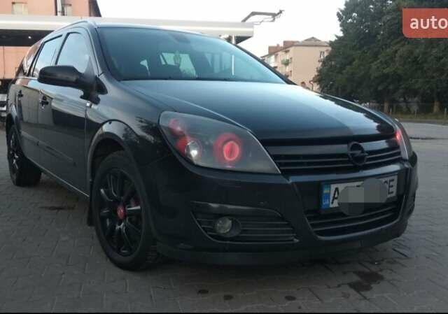 Черный Опель Астра, объемом двигателя 1.9 л и пробегом 320 тыс. км за 4999 $, фото 14 на Automoto.ua