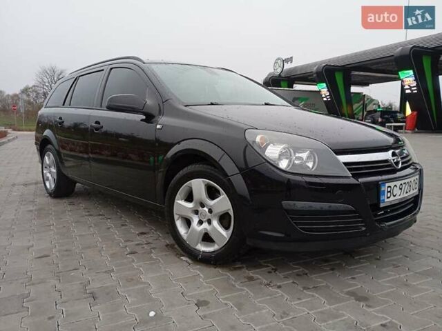 Черный Опель Астра, объемом двигателя 1.6 л и пробегом 293 тыс. км за 4200 $, фото 4 на Automoto.ua