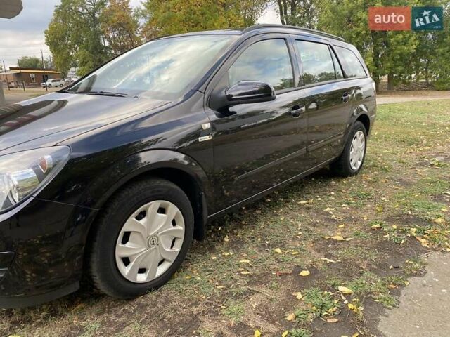 Черный Опель Астра, объемом двигателя 1.6 л и пробегом 197 тыс. км за 5500 $, фото 1 на Automoto.ua