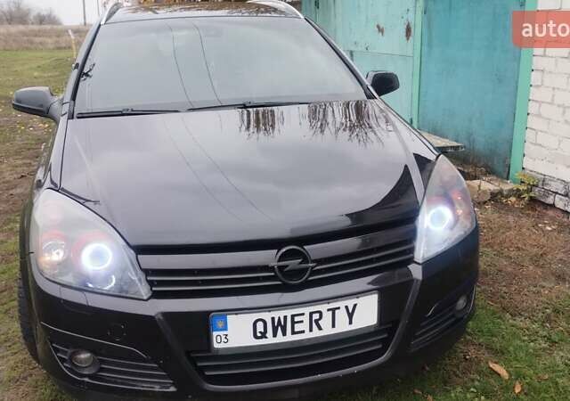Черный Опель Астра, объемом двигателя 1.9 л и пробегом 320 тыс. км за 4999 $, фото 5 на Automoto.ua