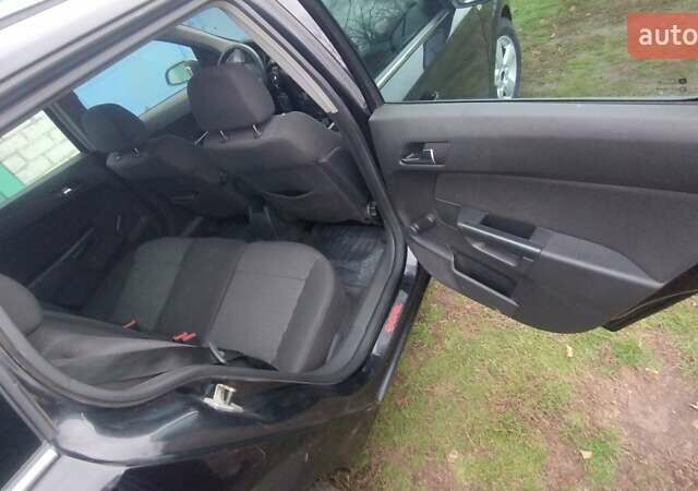 Черный Опель Астра, объемом двигателя 1.9 л и пробегом 320 тыс. км за 4999 $, фото 2 на Automoto.ua