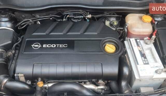 Черный Опель Астра, объемом двигателя 1.9 л и пробегом 320 тыс. км за 4999 $, фото 13 на Automoto.ua