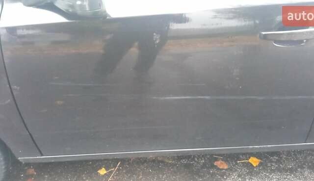 Черный Опель Астра, объемом двигателя 1.69 л и пробегом 387 тыс. км за 3500 $, фото 10 на Automoto.ua