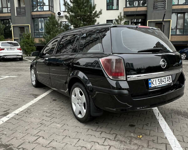 Черный Опель Астра, объемом двигателя 1.7 л и пробегом 330 тыс. км за 5200 $, фото 8 на Automoto.ua