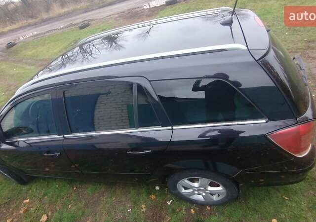 Черный Опель Астра, объемом двигателя 1.9 л и пробегом 320 тыс. км за 4999 $, фото 3 на Automoto.ua