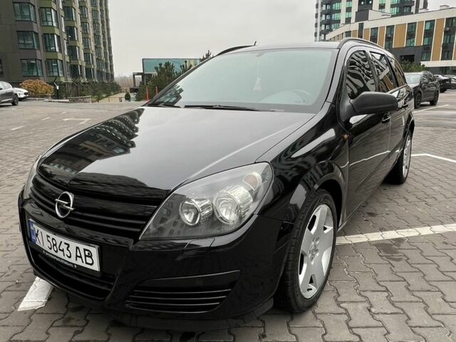 Черный Опель Астра, объемом двигателя 1.7 л и пробегом 330 тыс. км за 5200 $, фото 1 на Automoto.ua