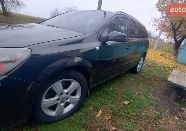 Черный Опель Астра, объемом двигателя 1.9 л и пробегом 320 тыс. км за 4999 $, фото 9 на Automoto.ua