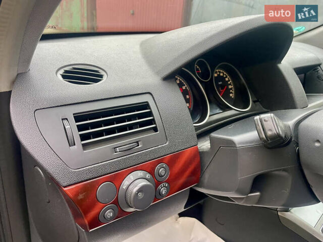 Черный Опель Астра, объемом двигателя 1.6 л и пробегом 211 тыс. км за 4700 $, фото 11 на Automoto.ua