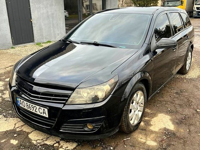 Черный Опель Астра, объемом двигателя 1.7 л и пробегом 292 тыс. км за 4000 $, фото 3 на Automoto.ua