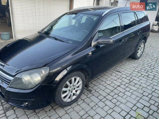 Черный Опель Астра, объемом двигателя 1.7 л и пробегом 240 тыс. км за 3500 $, фото 9 на Automoto.ua
