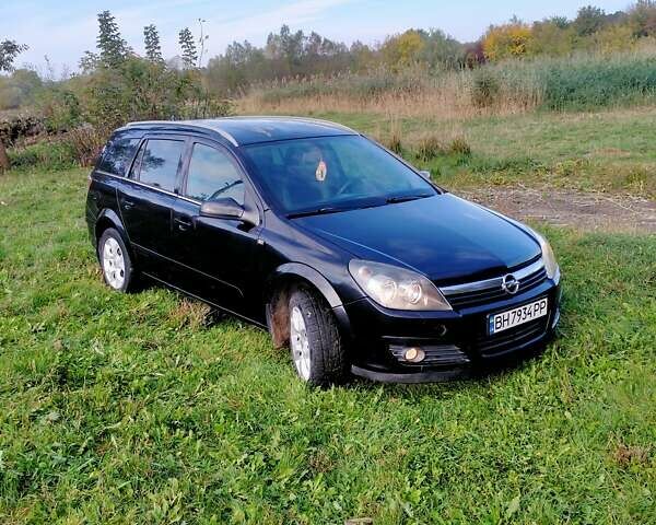 Черный Опель Астра, объемом двигателя 1.7 л и пробегом 212 тыс. км за 4700 $, фото 3 на Automoto.ua