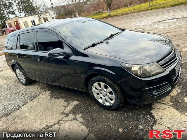 Черный Опель Астра, объемом двигателя 1.7 л и пробегом 292 тыс. км за 4000 $, фото 2 на Automoto.ua