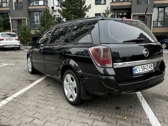 Черный Опель Астра, объемом двигателя 1.7 л и пробегом 330 тыс. км за 5200 $, фото 3 на Automoto.ua