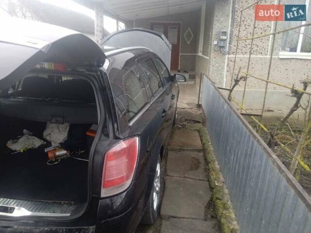 Черный Опель Астра, объемом двигателя 1.8 л и пробегом 198 тыс. км за 4800 $, фото 26 на Automoto.ua