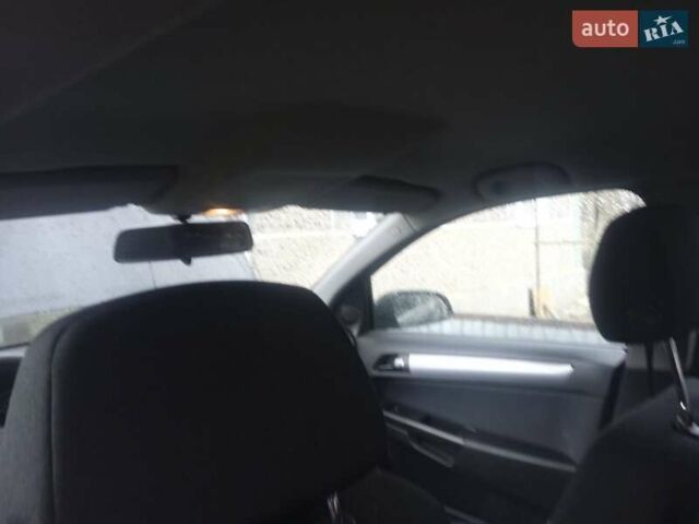 Черный Опель Астра, объемом двигателя 1.8 л и пробегом 198 тыс. км за 4800 $, фото 11 на Automoto.ua