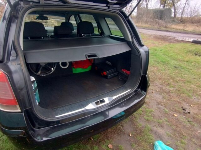 Черный Опель Астра, объемом двигателя 1.9 л и пробегом 320 тыс. км за 4999 $, фото 9 на Automoto.ua