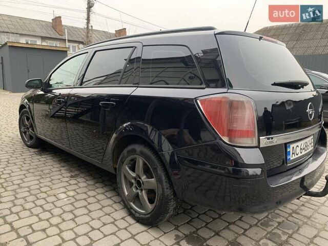 Чорний Опель Астра, об'ємом двигуна 1.25 л та пробігом 317 тис. км за 3500 $, фото 6 на Automoto.ua