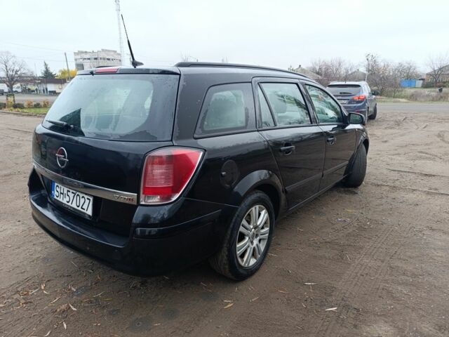 Черный Опель Астра, объемом двигателя 1.7 л и пробегом 333 тыс. км за 1900 $, фото 3 на Automoto.ua