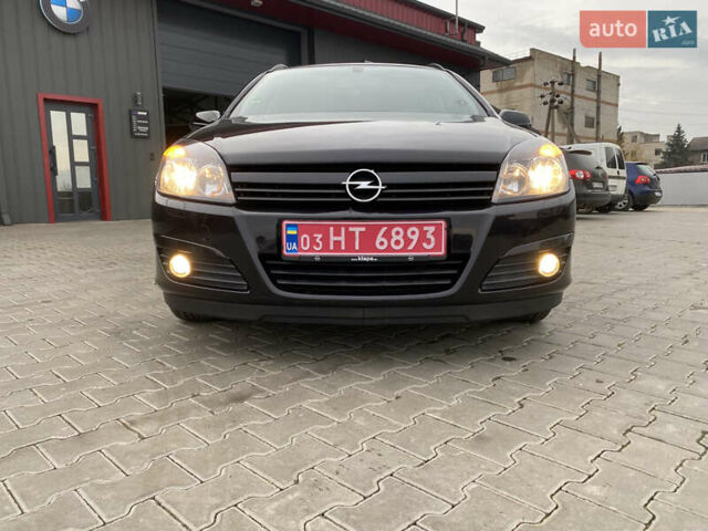 Черный Опель Астра, объемом двигателя 1.6 л и пробегом 231 тыс. км за 4800 $, фото 13 на Automoto.ua