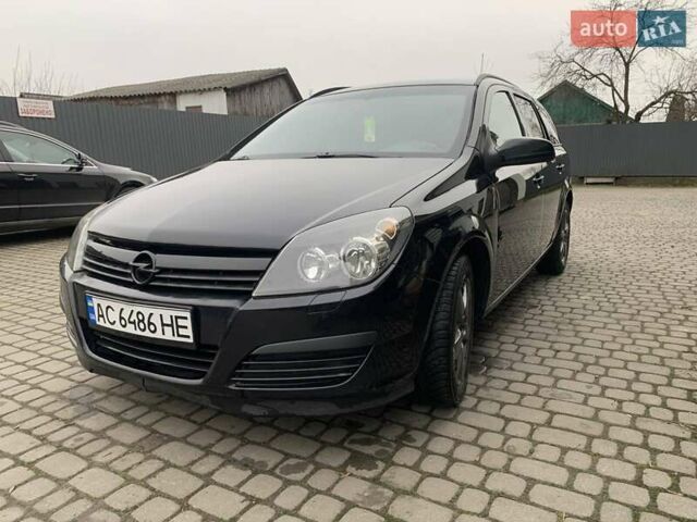 Чорний Опель Астра, об'ємом двигуна 1.25 л та пробігом 317 тис. км за 3500 $, фото 7 на Automoto.ua