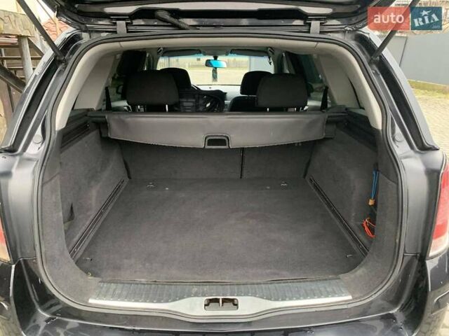 Чорний Опель Астра, об'ємом двигуна 1.25 л та пробігом 317 тис. км за 3500 $, фото 8 на Automoto.ua