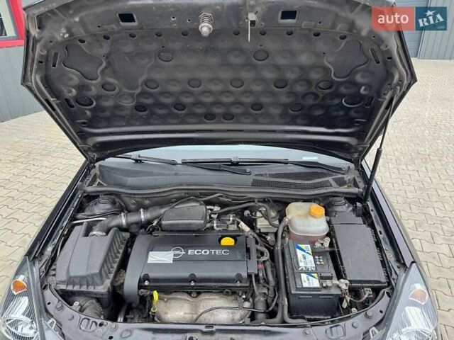 Черный Опель Астра, объемом двигателя 1.6 л и пробегом 229 тыс. км за 4900 $, фото 13 на Automoto.ua