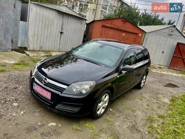 Черный Опель Астра, объемом двигателя 1.6 л и пробегом 211 тыс. км за 4700 $, фото 4 на Automoto.ua