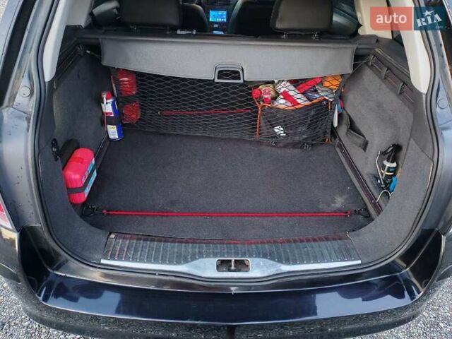 Черный Опель Астра, объемом двигателя 1.6 л и пробегом 245 тыс. км за 4500 $, фото 19 на Automoto.ua